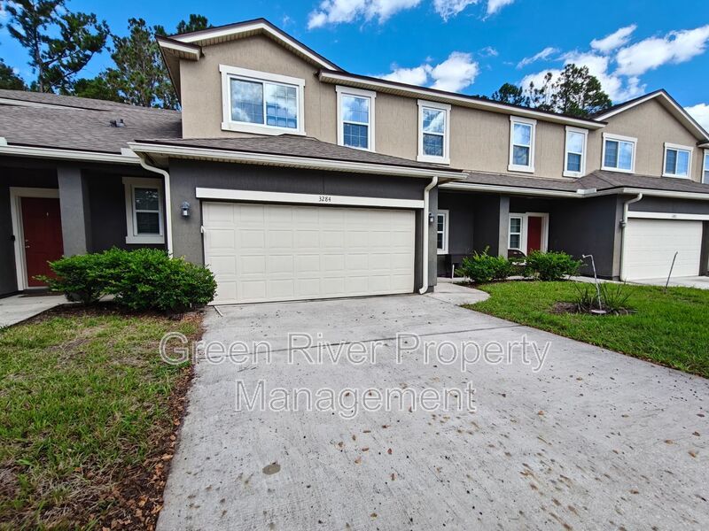 Modern 3-Bedroom Townhome with 2-Car Garage and Screened Porch property image
