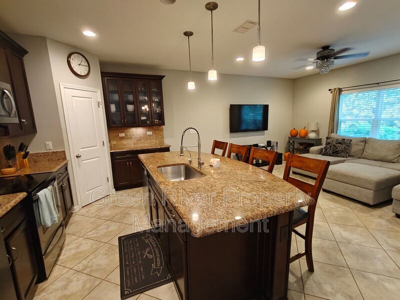 Modern 3-Bedroom Townhome with 2-Car Garage and Screened Porch property image