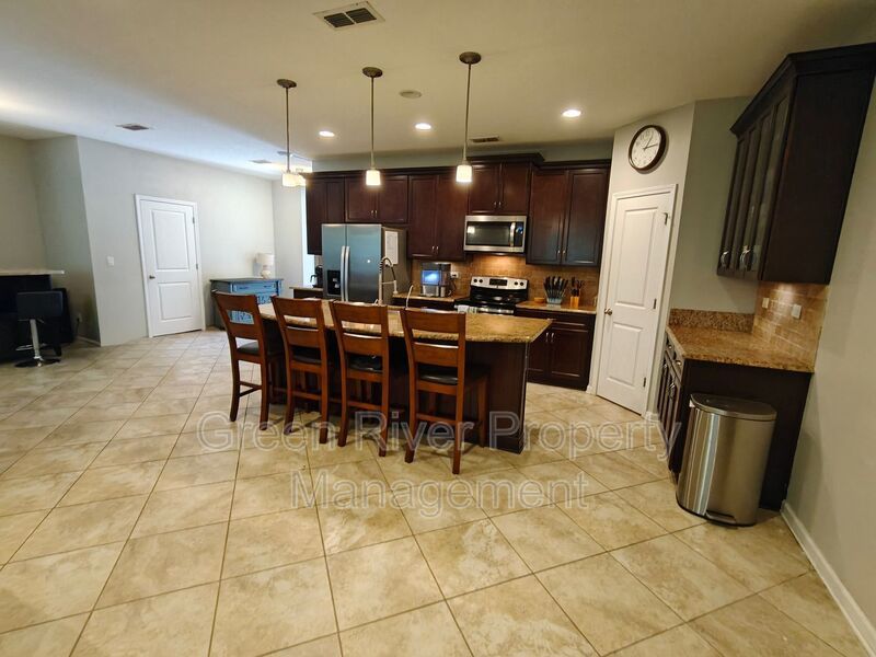 Modern 3-Bedroom Townhome with 2-Car Garage and Screened Porch property image