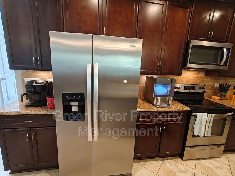 Modern 3-Bedroom Townhome with 2-Car Garage and Screened Porch property image