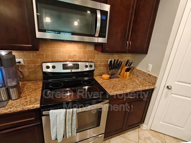 Modern 3-Bedroom Townhome with 2-Car Garage and Screened Porch property image