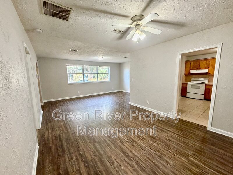 Spacious & Stylish 4-Bedroom Retreat with Den, Fireplace in Spring Park! property image