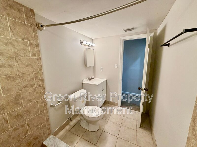 Spacious & Stylish 4-Bedroom Retreat with Den, Fireplace in Spring Park! property image