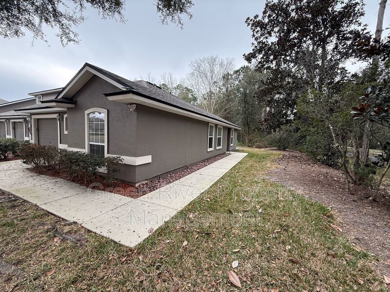 One-Story End Unit Oasis Backing to Preserve - No Carpet + Plantation Amenities!! property image