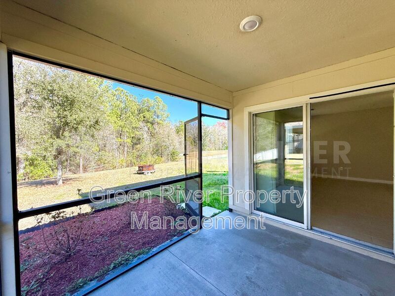 Room to Live, Space to Thrive! Stunning 6BR Home with Solar, Upgrades & Screened Lanai in Macclenny!! property image