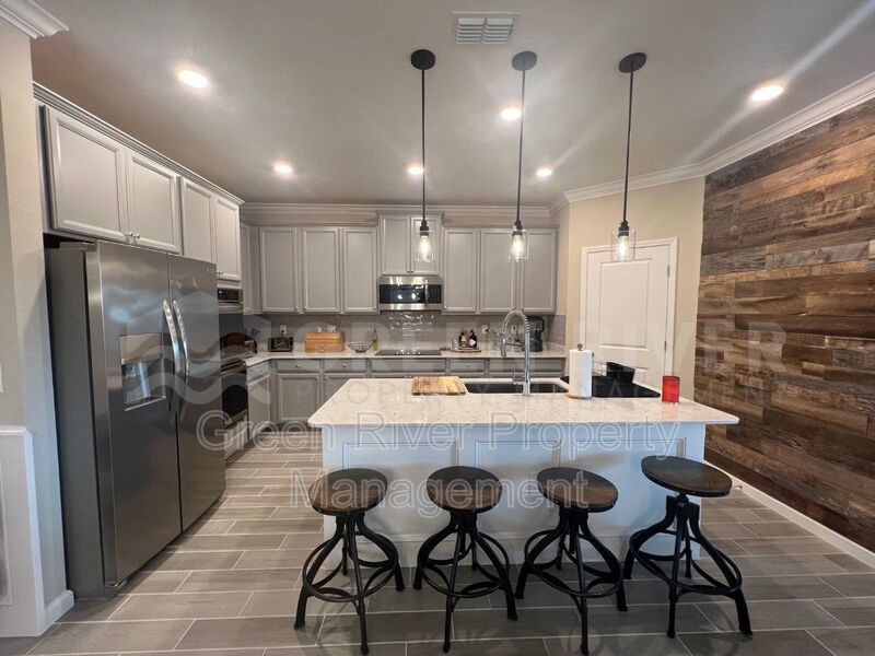 Stylish 4BR Retreat with Pond Views in Amenity-Rich Longleaf!! property image
