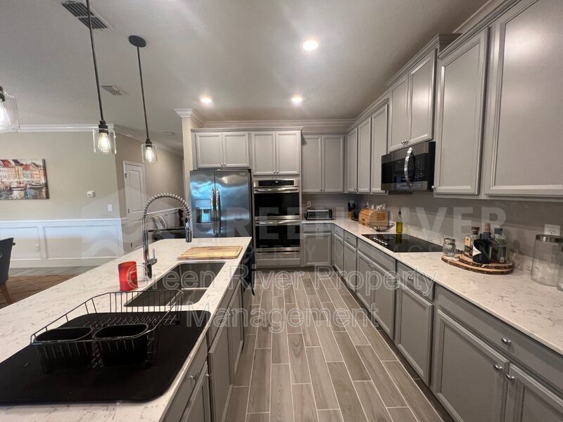 Stylish 4BR Retreat with Pond Views in Amenity-Rich Longleaf!! property image
