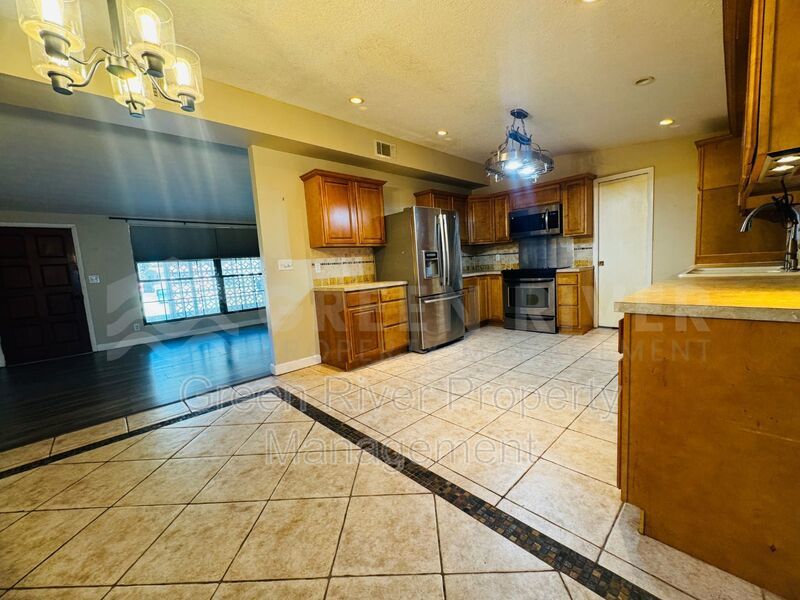 Poolside Living in Style!!  Renovated 4BR Home with Open Floor Plan & Pet-Friendly Perks! property image