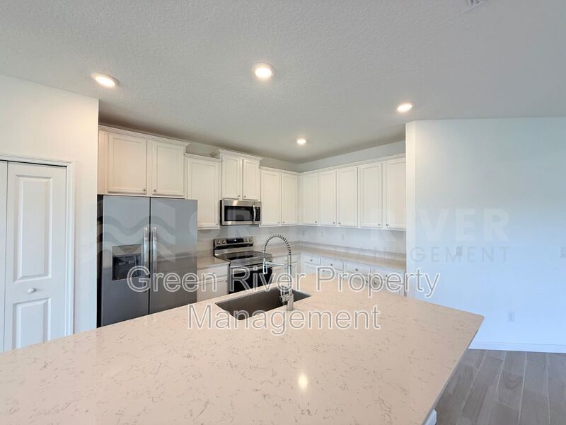 Spacious 4-Bed, 2-Bath Home with 3-Car Garage in Granary Park – Resort-Style Amenities! property image