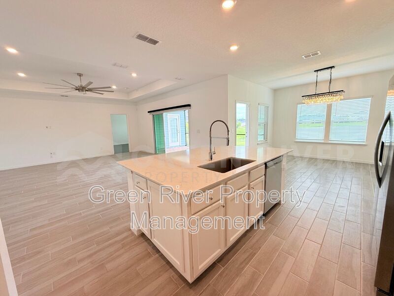 Spacious 4-Bed, 2-Bath Home with 3-Car Garage in Granary Park – Resort-Style Amenities! property image