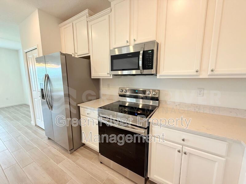 Spacious 4-Bed, 2-Bath Home with 3-Car Garage in Granary Park – Resort-Style Amenities! property image