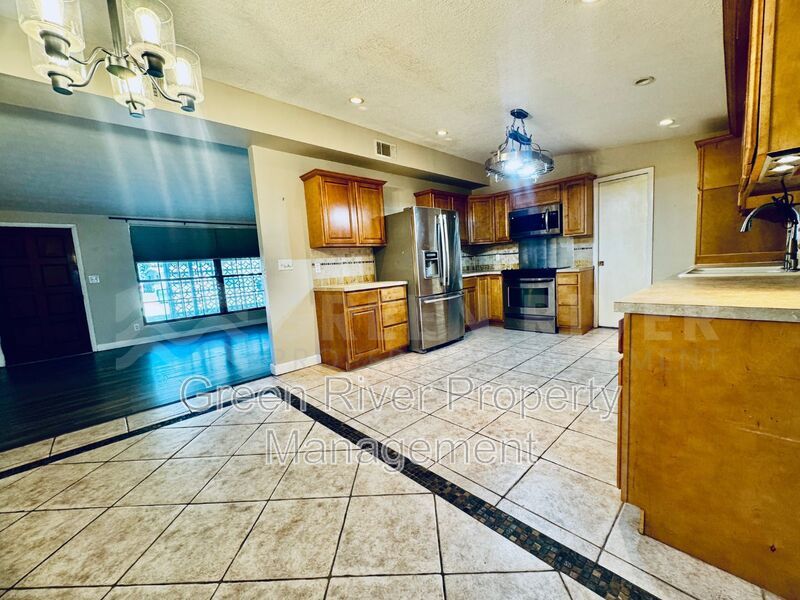 Poolside Living in Style!!  Renovated 4BR Home with Open Floor Plan & Pet-Friendly Perks! property image