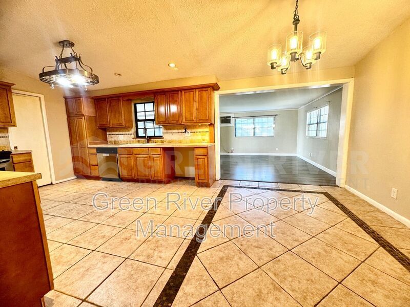 Poolside Living in Style!!  Renovated 4BR Home with Open Floor Plan & Pet-Friendly Perks! property image
