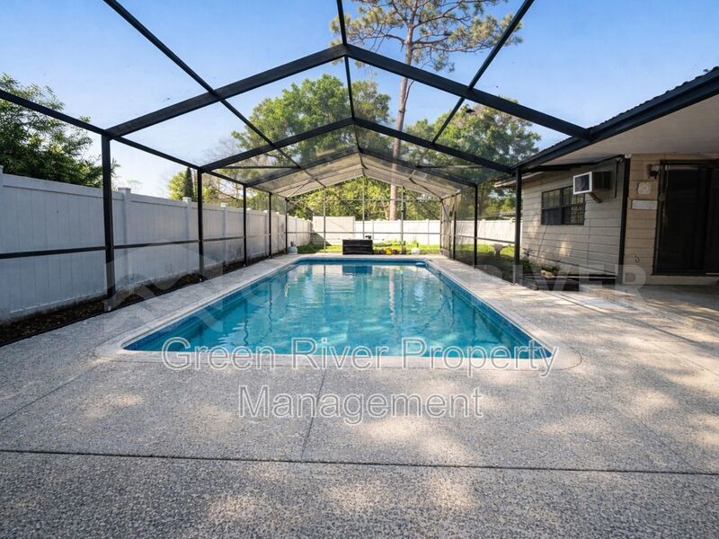 Poolside Living in Style!!  Renovated 4BR Home with Open Floor Plan & Pet-Friendly Perks! property image