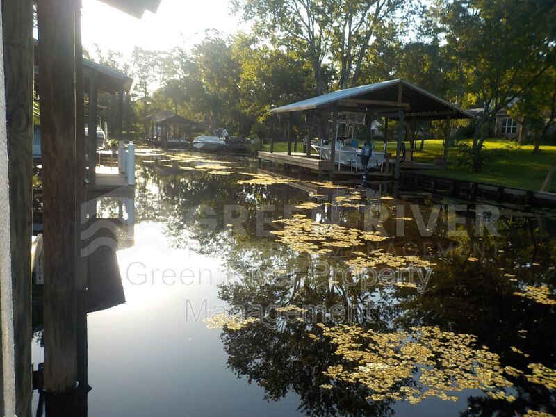 Dockside Living: Waterfront Home with Private Boat Lift, Jet Ski Access & Sunset Views! property image