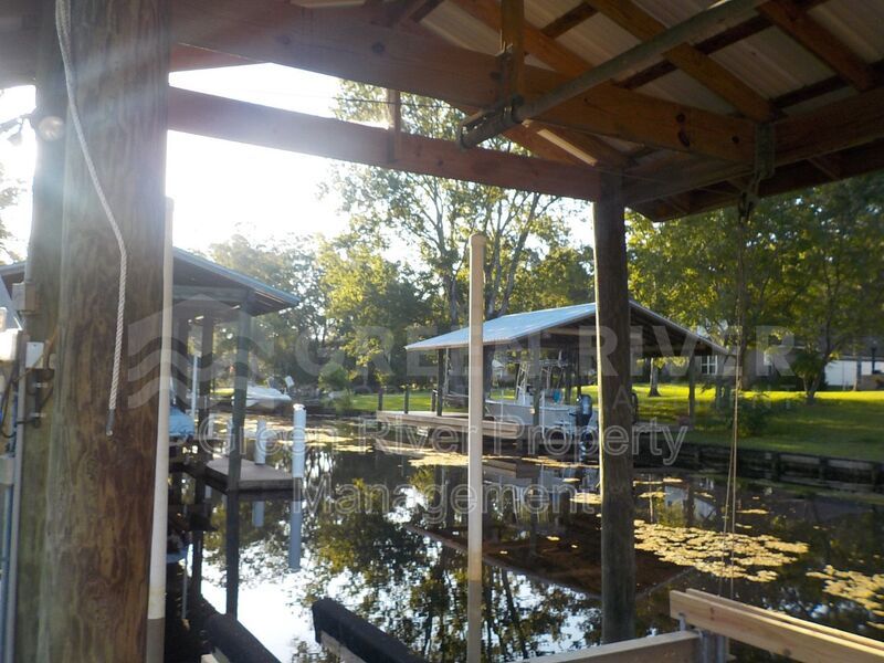Dockside Living: Waterfront Home with Private Boat Lift, Jet Ski Access & Sunset Views! property image
