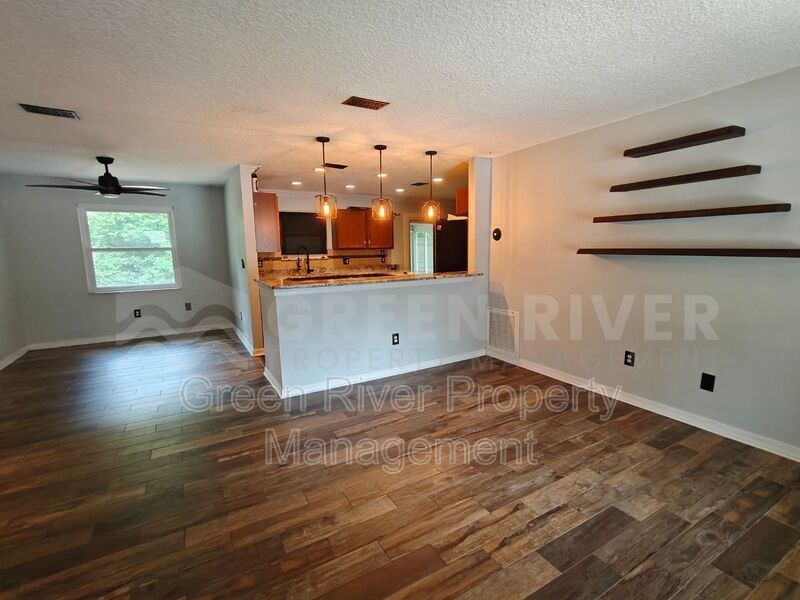 Stylish 4BR Home with Solar Panels, Florida Room & Outdoor Entertaining Space!! property image