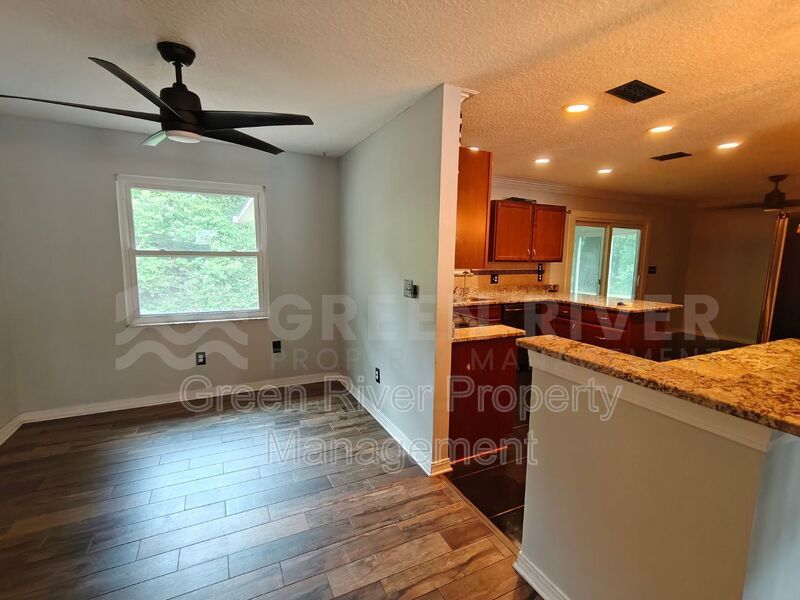 Stylish 4BR Home with Solar Panels, Florida Room & Outdoor Entertaining Space!! property image