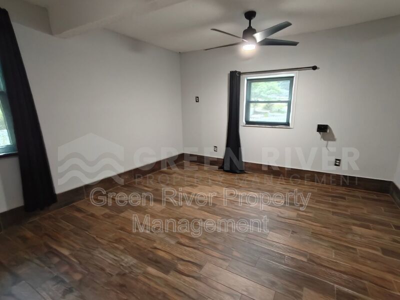 Stylish 4BR Home with Solar Panels, Florida Room & Outdoor Entertaining Space!! property image