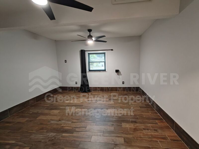 Stylish 4BR Home with Solar Panels, Florida Room & Outdoor Entertaining Space!! property image