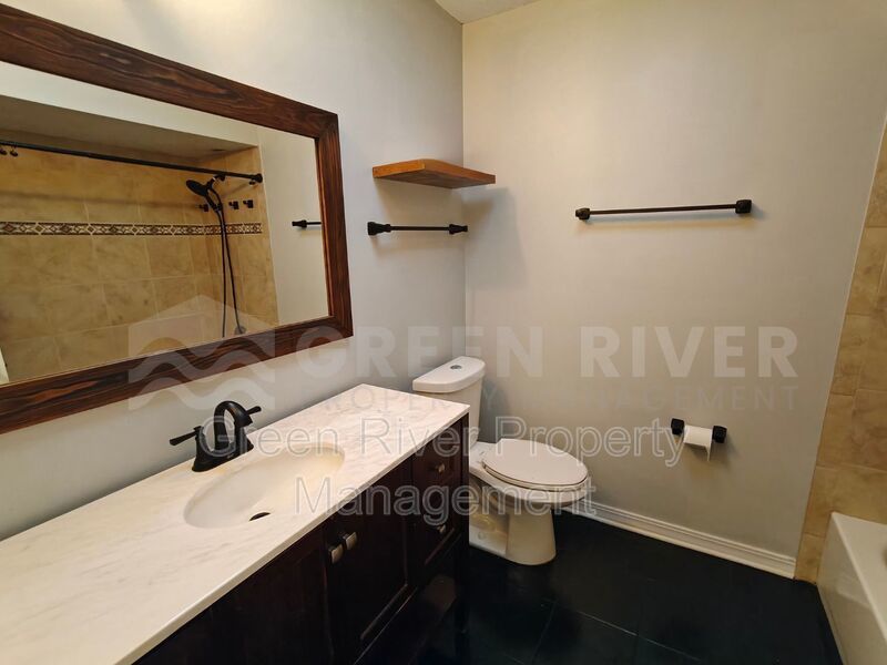 Stylish 4BR Home with Solar Panels, Florida Room & Outdoor Entertaining Space!! property image