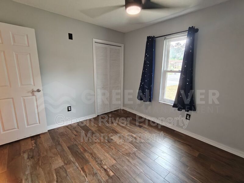 Stylish 4BR Home with Solar Panels, Florida Room & Outdoor Entertaining Space!! property image