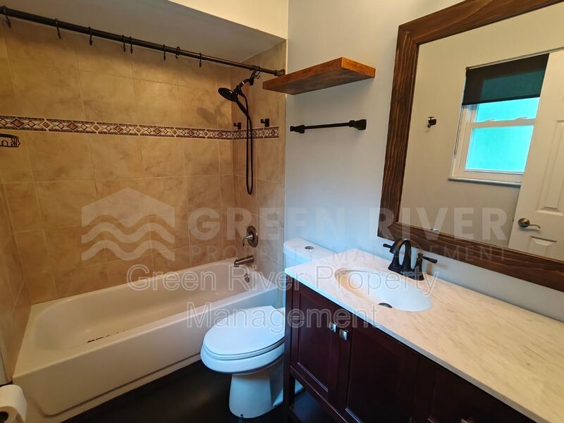 Stylish 4BR Home with Solar Panels, Florida Room & Outdoor Entertaining Space!! property image