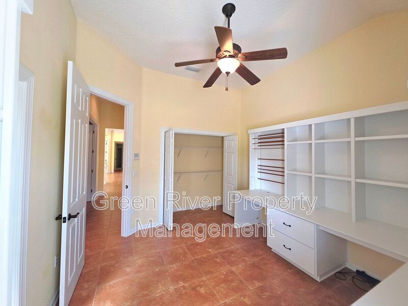 Spacious 5BR/5BA Home with Screened Pool & Pond View in Eagle Harbor at Black Creek! property image