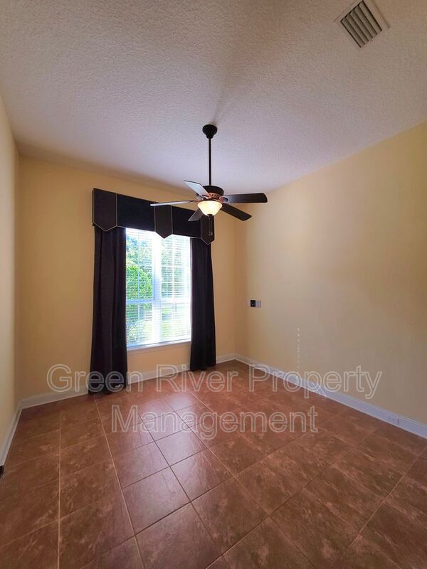 Spacious 5BR/5BA Home with Screened Pool & Pond View in Eagle Harbor at Black Creek! property image