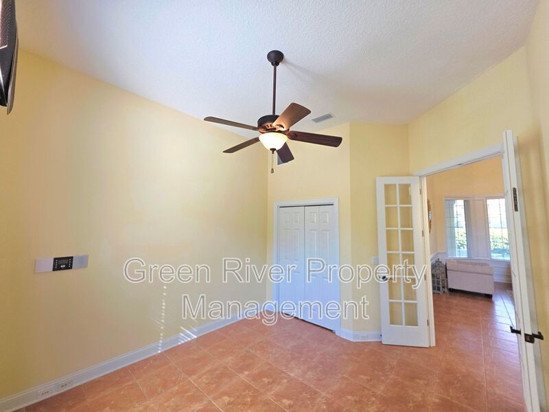 Spacious 5BR/5BA Home with Screened Pool & Pond View in Eagle Harbor at Black Creek! property image