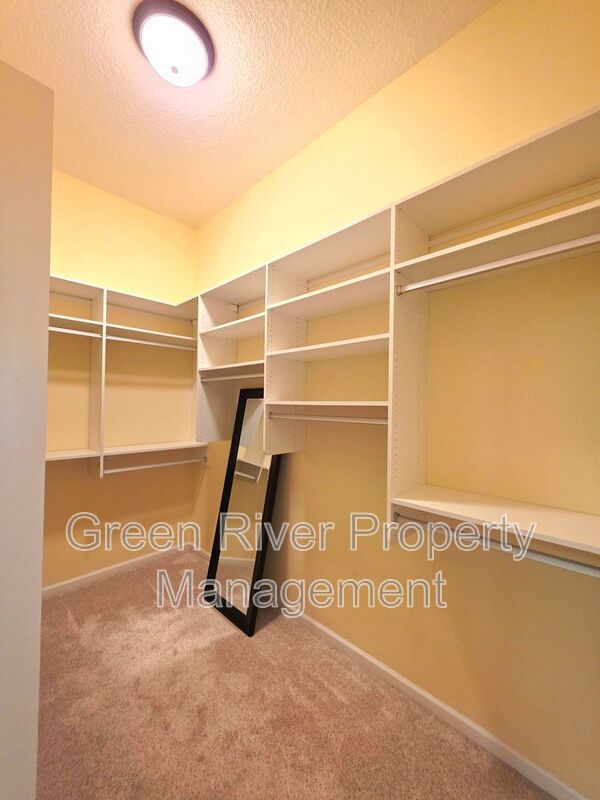 Spacious 5BR/5BA Home with Screened Pool & Pond View in Eagle Harbor at Black Creek! property image