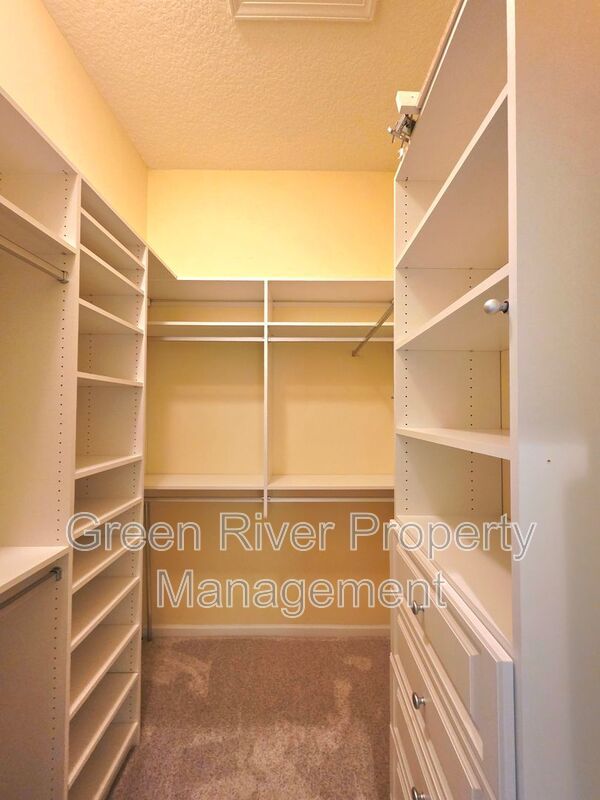 Spacious 5BR/5BA Home with Screened Pool & Pond View in Eagle Harbor at Black Creek! property image