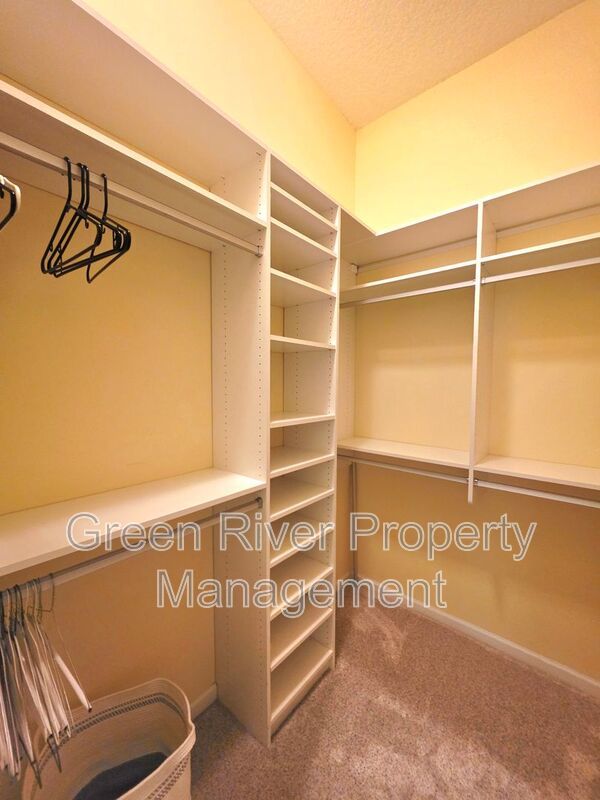 Spacious 5BR/5BA Home with Screened Pool & Pond View in Eagle Harbor at Black Creek! property image