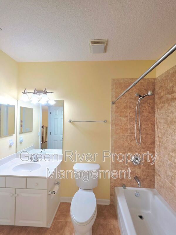 Spacious 5BR/5BA Home with Screened Pool & Pond View in Eagle Harbor at Black Creek! property image